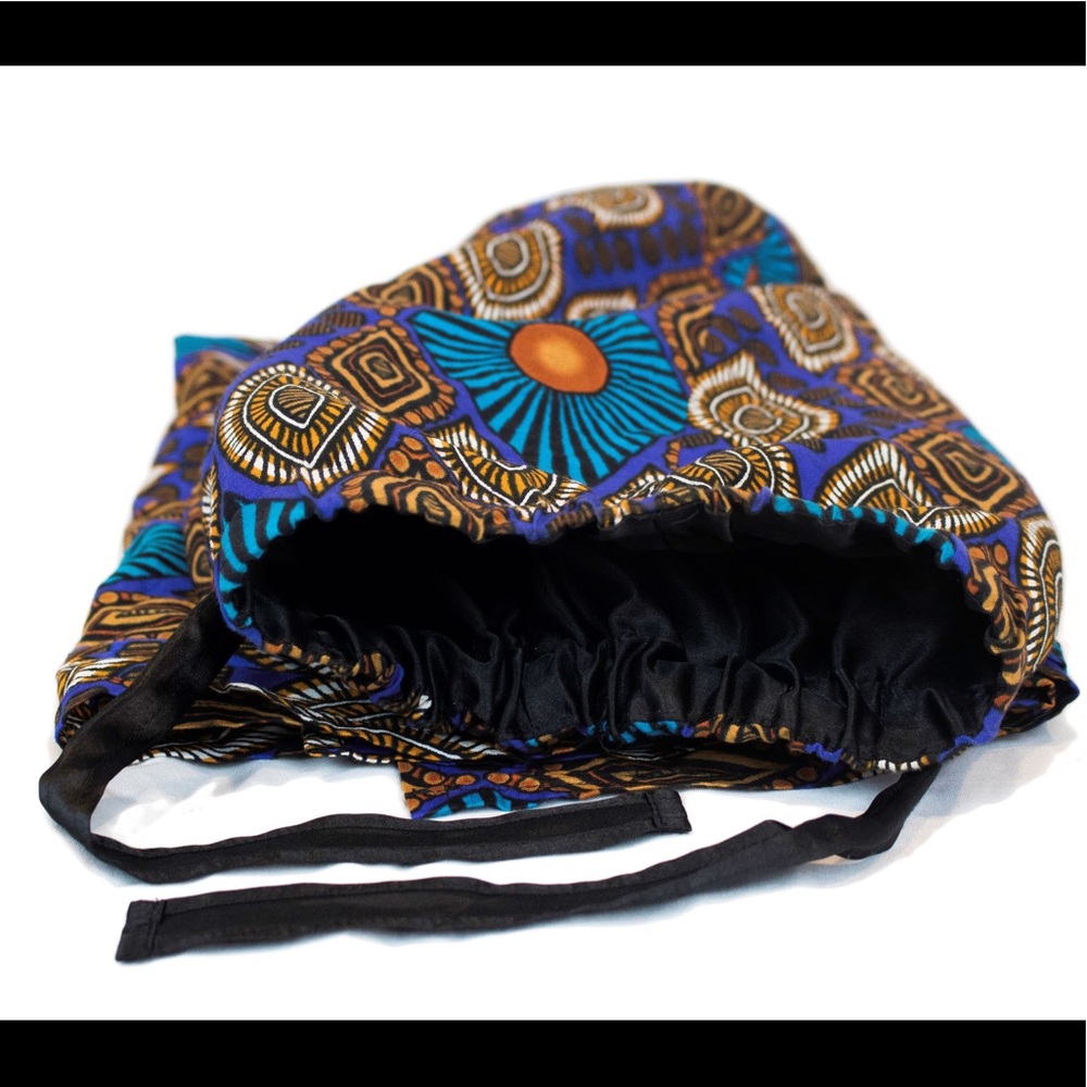 Blue long-cap head wrap. Minor manufacturing uh-oh